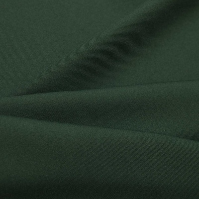 Ткань костюмная 21010 2076, 225 гр/м2, шир.150см, цвет т.зеленый - купить в Костроме. Цена 394.71 руб.